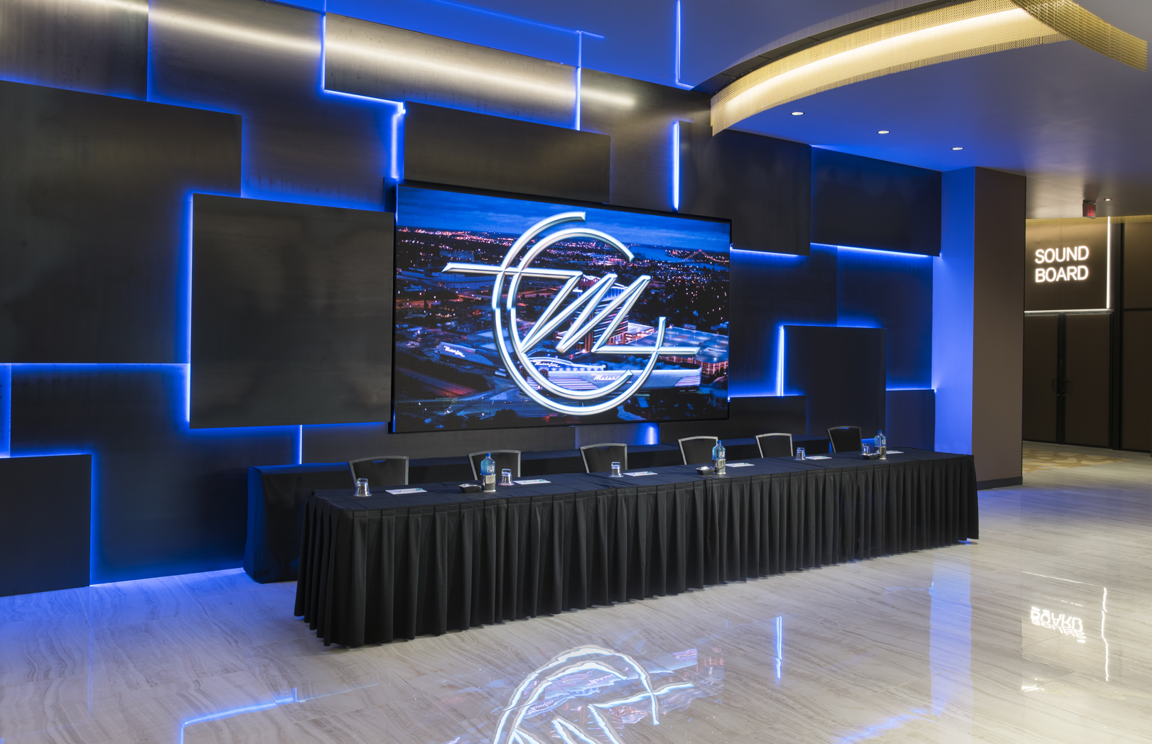 Convention center registration table with Detroit skyline display at MotorCity Casino Hotel