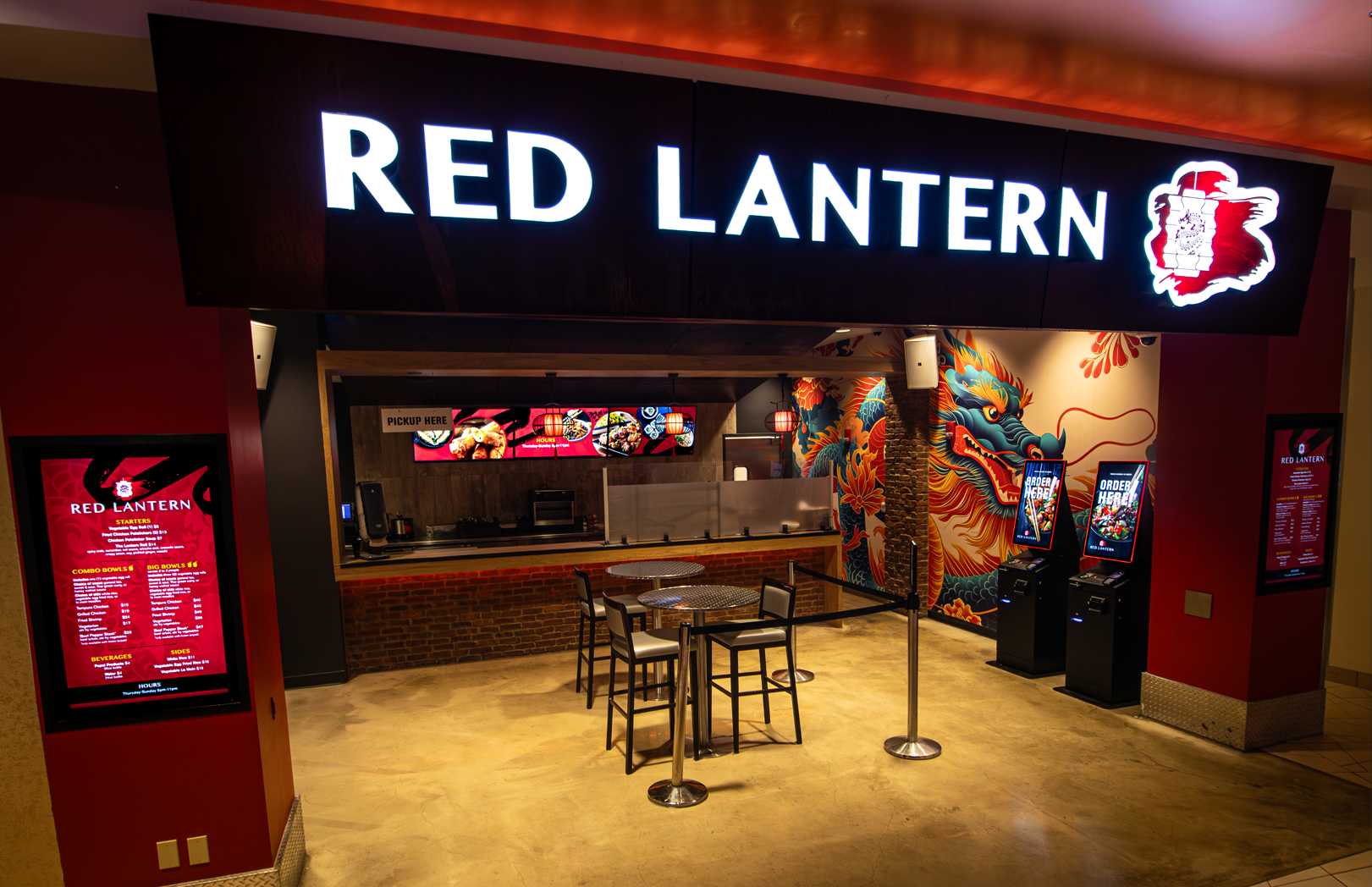 Red Lantern restaurant entrance with ordering kiosks and pickup counter