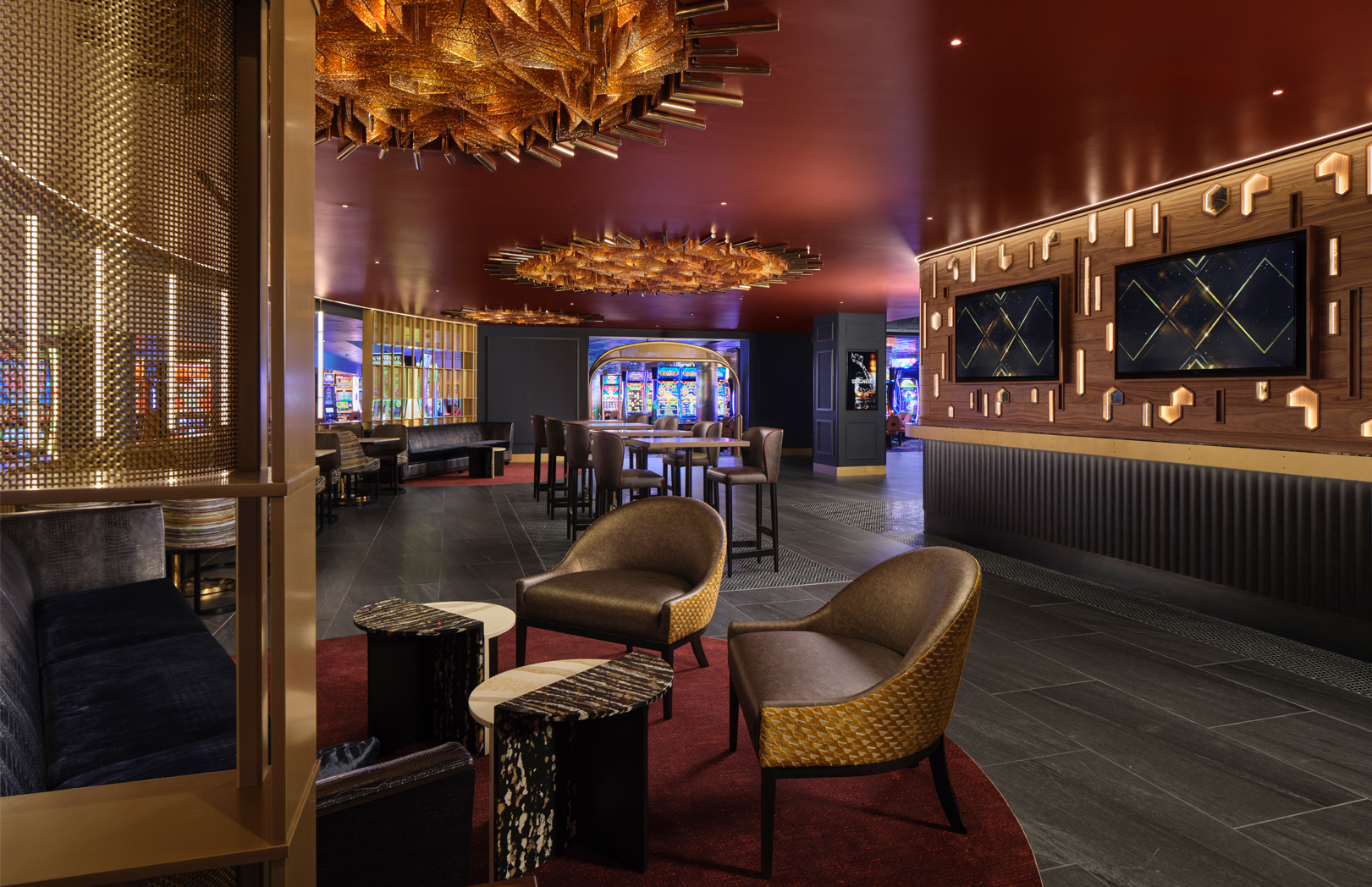 The Wagner interior at MotorCity Casino Hotel with wall-mounted TVs